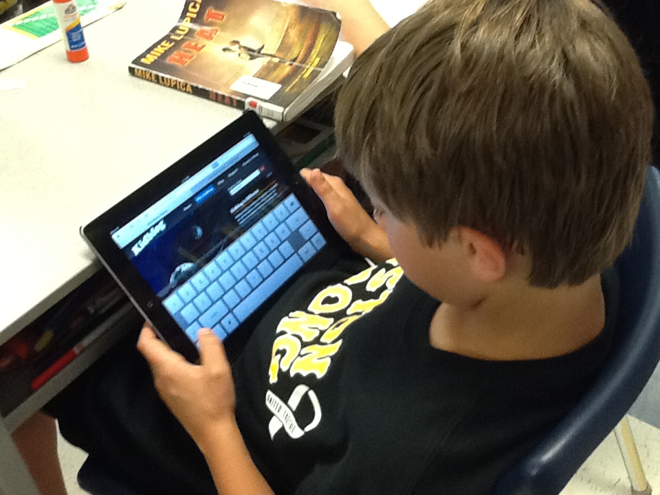 Photo of student using an iPad